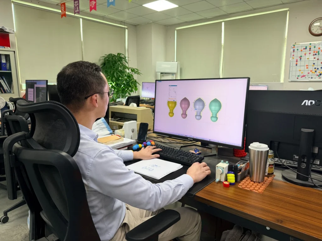Maiyees engineer modeling a custom silicone product in 3D CAD before prototyping and mold making